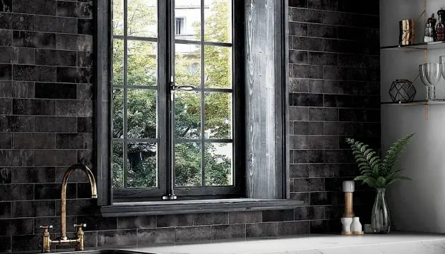 Mid shot of bathroom window and faucet